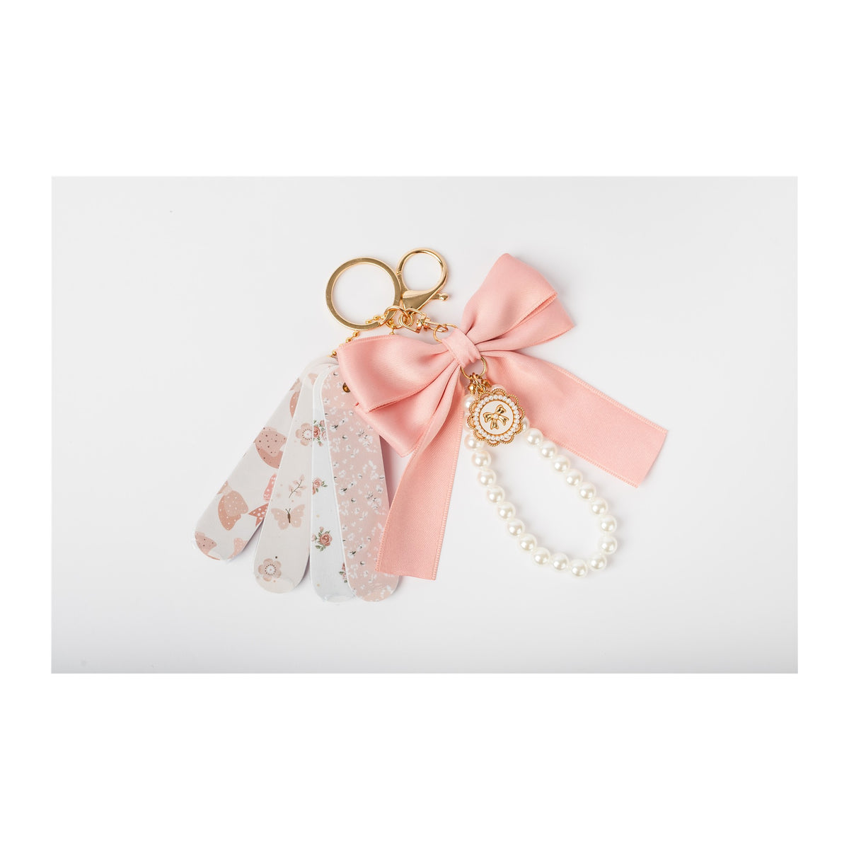 Full COQ201 mini nail file keychain set on square white background