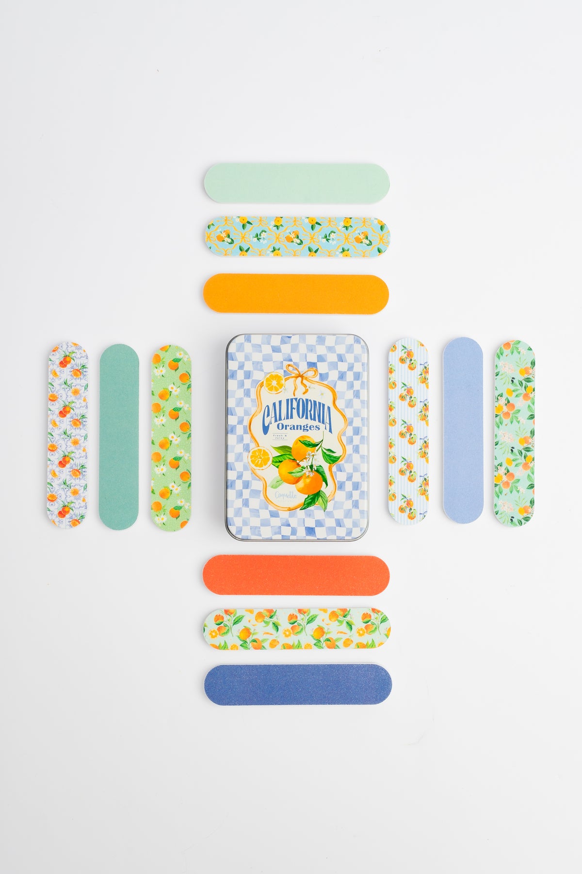COQ5305 Orange tin surrounded by all 12 mini nail file designs