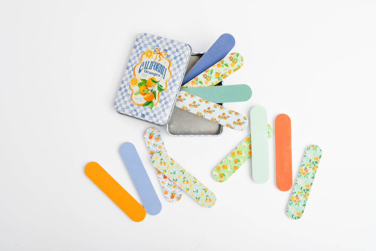 COQ5305 Orange mini nail file tin open with all 12 patterned nail files