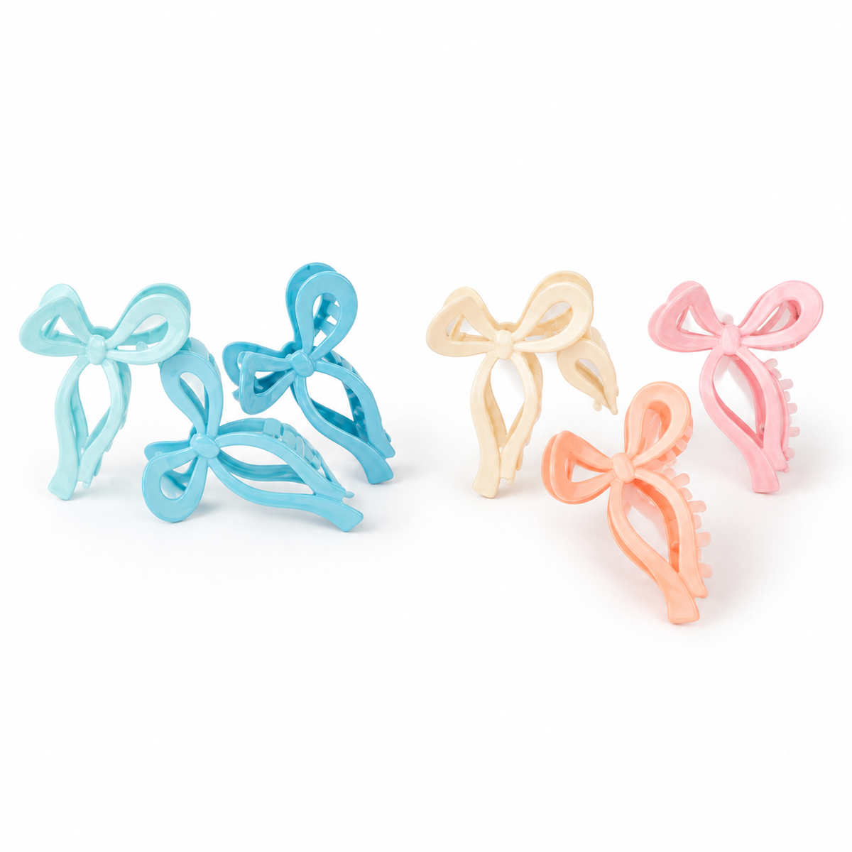 Both Coquette Couture three-piece bow clip styles, turquoise and pastel pink