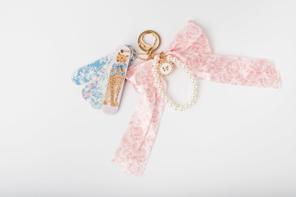 Coquette mini nail file keychain set COQ5265, photographed outside its packaging to show the files and charms