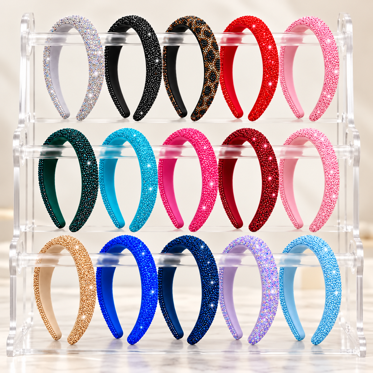 All fifteen Glitz & Glam Headband colors on a clear display stand