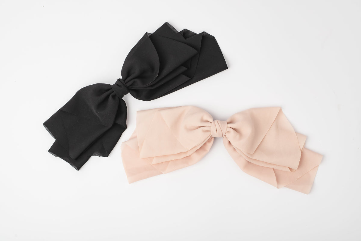 Black and Bashful oversized black and blush bow set without packaging