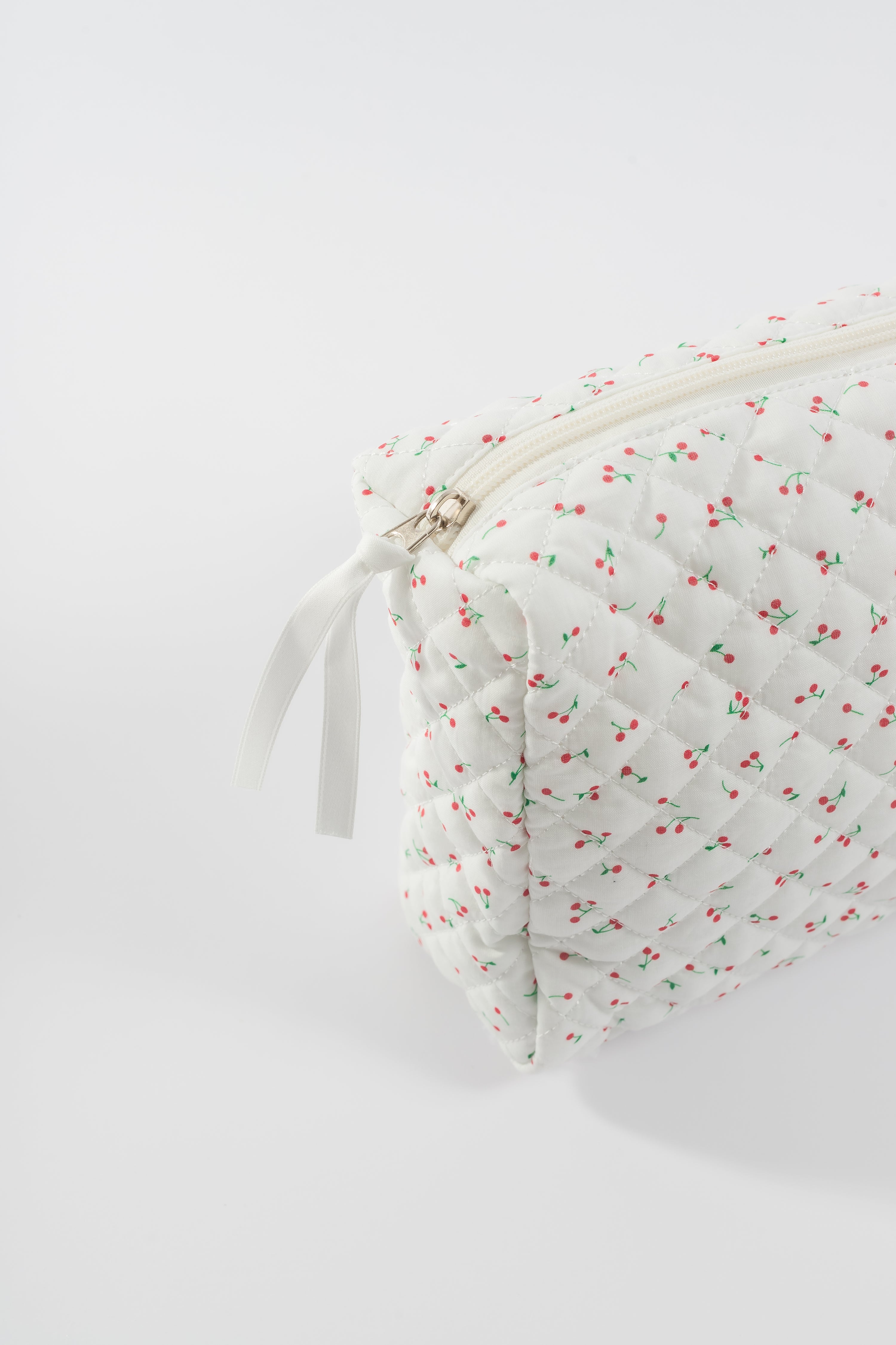 QUILTED COSMETIC BAG